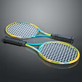 Two Colorful Tennis Rackets With Yellow Blue Frames And Black Grips