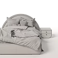 Modern Bedroom Setup With Upholstered Bed Frame And Decorative Pillows