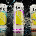 Three Colorful Too Drink Cans With Lemon Design Splashing Water And Blue Light