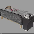 Spa Massage Bed with Rolled Towels Red Petals Gray Sheet White Bowl on Black Table
