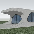 Modern Concrete Entrance Gate With Curved Design Large Windows And Green Grassland