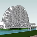Modern Curved Hotel Building With Multi story Windows Waterfront And Green Area