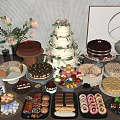 Assorted Dessert Display With Multi Layer Cake Chocolate Cake Macarons Cookies Donuts And Flowers 3d model
