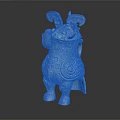 Ancient Bronze Horned Animal Shaped Artifact With Spiral Patterns And Ornate Design