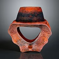 Artistic Sculpture Carving With Red And Black Top And Circular Hollow Base With Spiral Patterns