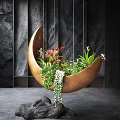 Hanging Copper Crescent Shaped Garden Decor Planter with Various Flowers Green Leaves and Trailing Plants