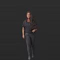 A Woman with Long Black Hair Wearing Black Top and Pants Against Black Background