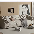 Beige Large Sectional Sofa with Throw Pillows Gray Blanket Books on Rug and Wooden Cabinets