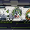 Modern Urban Plaza Design With Circular Landscaped Areas Greenery And Walkways