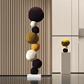 Multicolored Spherical Sculpture Carvings With Stacked Ball Design In Modern Interior Space