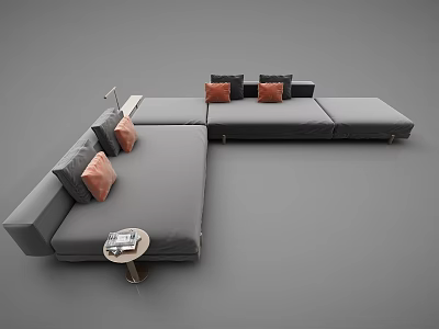 Modern Gray Sectional Sofa with Orange Pillows and Small Side Table with Magazines 3d model