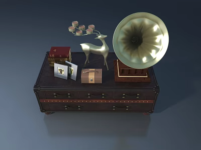 Silver Deer Sculpture Placed On Vintage Leather Trunk With Gramophone Books Photo Frame And Candle 3d model