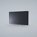 Contemporary Flat Screen Television With Black Frame And Sleek Silver Stand Design