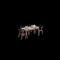 Modern Wooden Dining Table and Chair Set with Black Seats Plates and Glasses