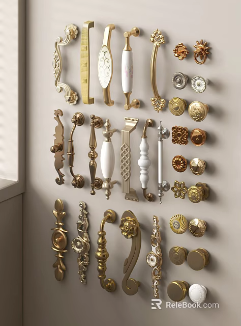Various Decorative Door Handles with Different Designs and Metallic Finishes on 3d model