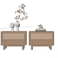 Natural Wood Nightstands with Rattan Drawers White Vases Branch Decor Stacked Books and Deer Figurine