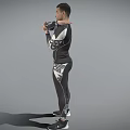 Man Wearing Black Tight Sportswear With White Accents Standing Arms Crossed On Gray Background