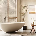 Freestanding White Bathtub In Modern Bathroom With Window Blinds Plants And Side Table