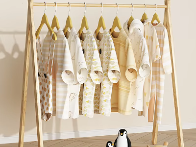 Wooden Clothes Rack Hanging Pastel Colored Baby Clothes With Small Penguin Toys Nearby 3d model