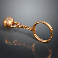Golden Metal Keychain With Spherical Charm And Chain For Daily Use