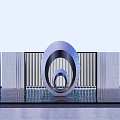 Modern Circular Landscape Sculpture With Metal Rings Background Fence And Water Reflection