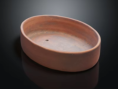 Rustic ceramic oval dish with a hole in the center 3d model
