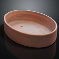 Rustic ceramic oval dish with a hole in the center 3d model
