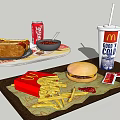 Fast Food Assortment Including Hamburger French Fries Coca Cola Hot Dogs And Ketchup Packets