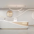 Curved Modern Reception Desk With White Beige Circular Logo And Decorative Lighting In Chill Studio