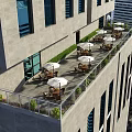 Rooftop Terrace With Outdoor Seating Umbrellas Green Plants And City View