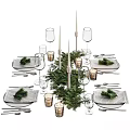 Elegant Modern Dinnerware Set With Striped Plates Wine Glasses Candles And Greenery Table Decoration