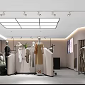 Modern Clothing Store Interior With Mannequins Hanging Garments Display Racks And Soft Lighting