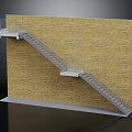 Modern Metal Staircase With Railings And Landing Against Yellow Brick Wall
