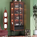 Modern Interior Wine Cabinet Design With Glass Doors Built in Lighting Green Wall And Plant