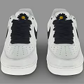 White Nike Sneakers With Black Laces And Small Yellow Flower On Tongue