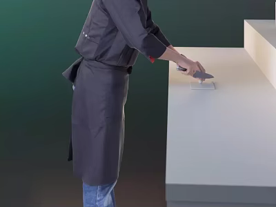 Man Wearing Black Apron Using Tool To Work On White Countertop Surface 3d model