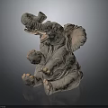 Cute Elephant Sculpture In Sitting Pose With Raised Trunk Large Ears And White Tusks