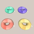Vibrant Donut Shaped Decorative Pillows in Green Purple Pink Yellow Tones