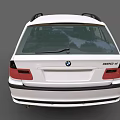 White BMW Wagon With Sleek Exterior Design Alloy Wheels And Front Grille