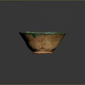 Green Glazed Ceramic Bowl With Rustic Brown Base And Textured Surface 3d model