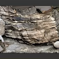 Natural Stone Material Featuring Layered Texture And Organic Rough Surface Design