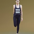 Woman In Sleeveless Top With HOPE Print And Black Leggings On Brown Background