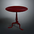 Red Round Wooden Table With Carved Legs And Elegant Vintage Style