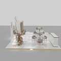 Modern Exhibition Booth Design With White Gold Accents Reception Counter And Decorative Plants