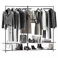 Stylish Various Clothes Hanging on Racks with Bags Shoes and Accessories