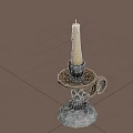 Decorative Metal Candle Holder With Lit Candle And Ornate Base Design