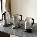 Stainless Steel Electric Kettles With Modern Design On Kitchen Counter Top