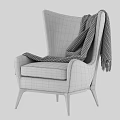 Modern Gray Armchair With Knitted Blanket And Black Wooden Legs