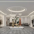 Modern Clothing Store Interior Featuring Women's Dresses Racks Mannequins Bright Lighting And Sofa