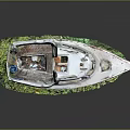 Detailed Decorative Model Boat With White And Blue Hull On Green Grass Dark Background